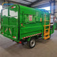green trash truck